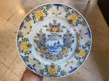 A polychrome Dutch Delft mixed technique plate, 18th C.